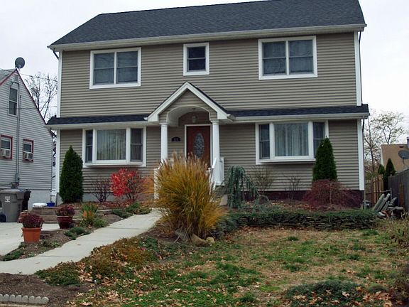 Professionally landscaped with paver planters