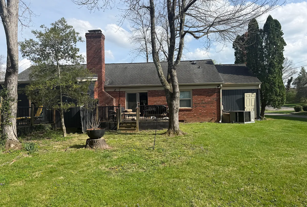 Back yard + Deck - 217 Fontaine Cir