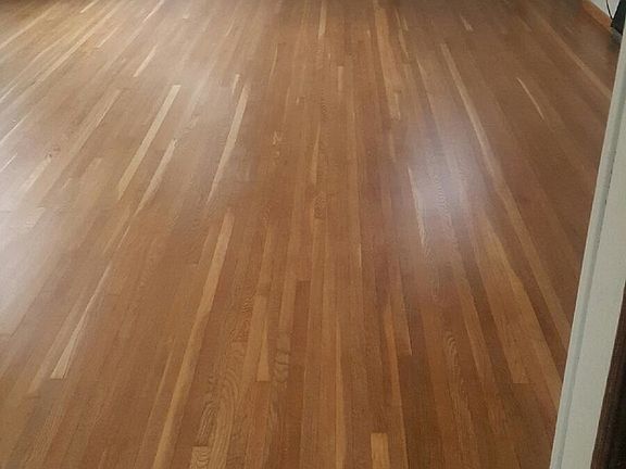 Newly refinished wood floors.