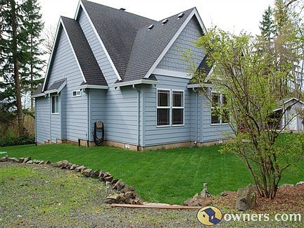 Left side of the house.
