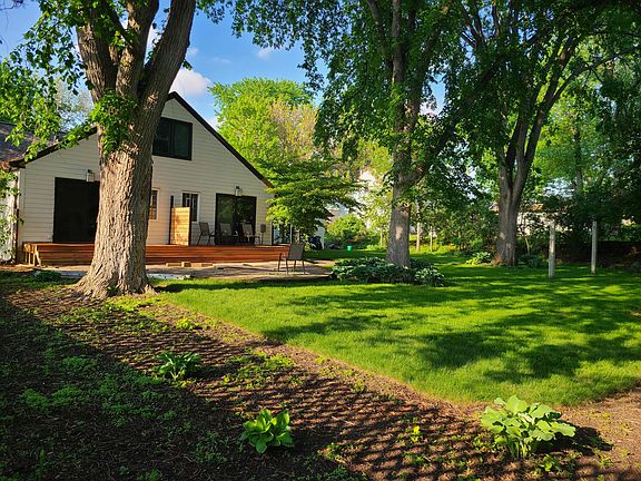 Stunning 1/2 acre yard with gardens