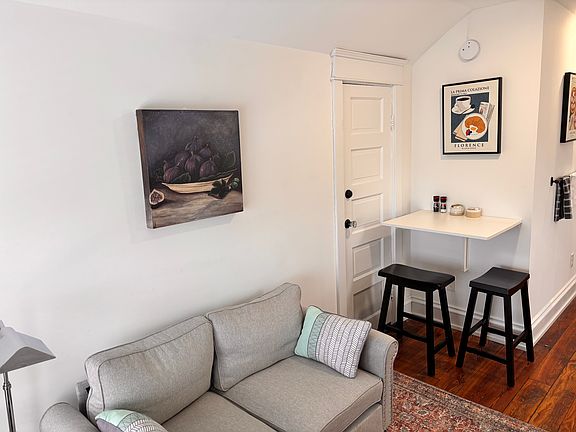 The compact and convenient table and stools serves well for meal time. The sitting area is perfect for reading or work space.