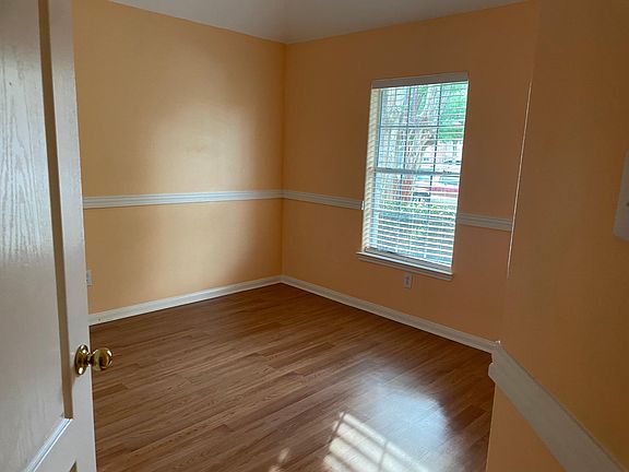 Bedroom 1 with moldings and big closet.