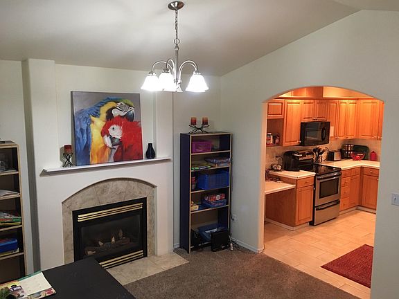 Den with gas fireplace.