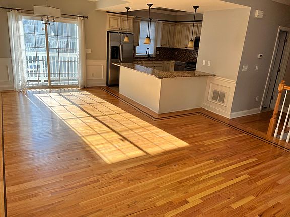 Open layout living room and dining room area. Full of great light.