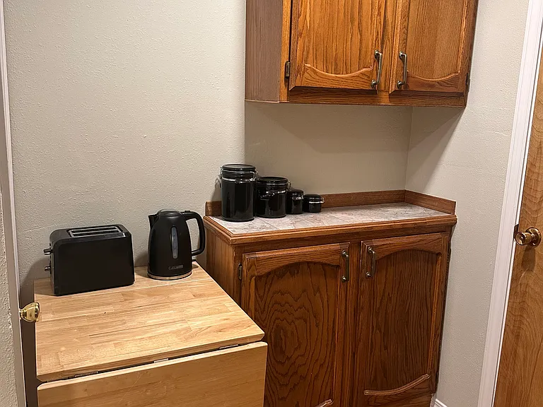 part of the kitchen is a little coffee prep area