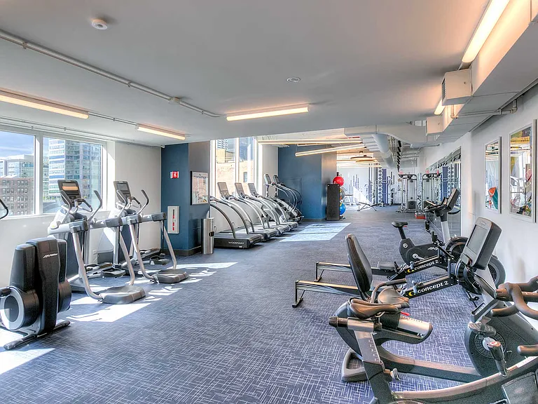 Stay active and at your best in our large fitness space that features high ceilings and state-of-the-art equipment with locker rooms and yoga studio.
