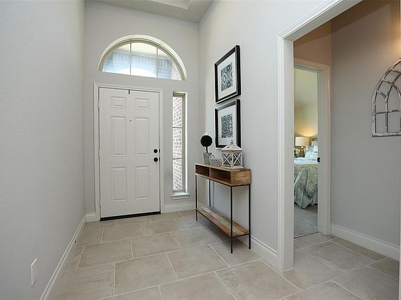 The designer neutral colors and upgraded larger baseboards used throughout the home add a sophisticated appeal.