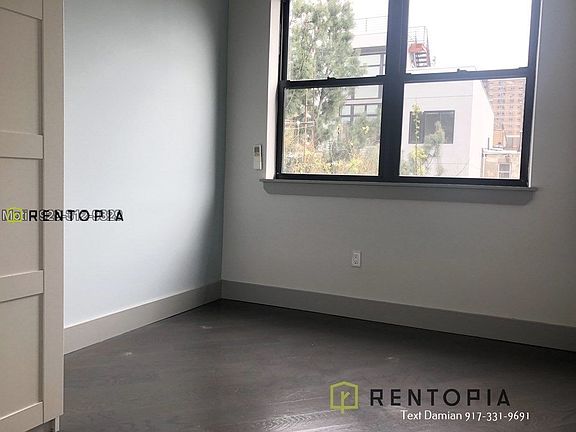 5th image of 202 Scholes St #103