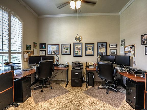Perfect space for the home office. Ample study with plantation shutters, additional crown molding an