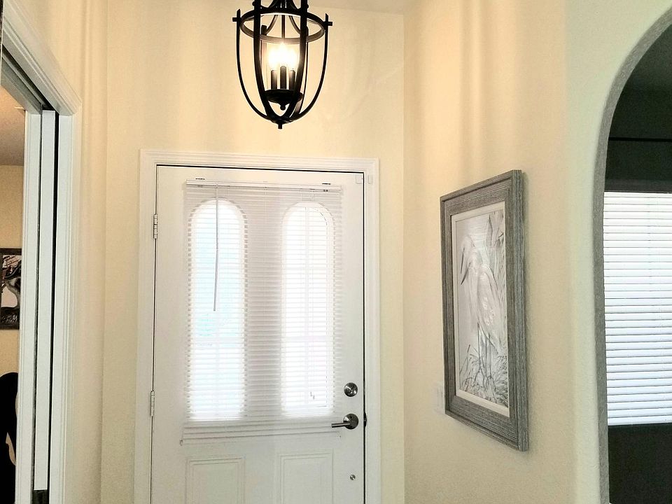 Elegant Entranceway leading to den and office