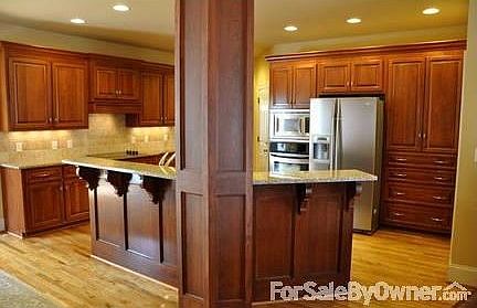 Living Room
						:
						Beautiful Mantle and Fireplace with Wonderful Natural Light from 4 Large Windows