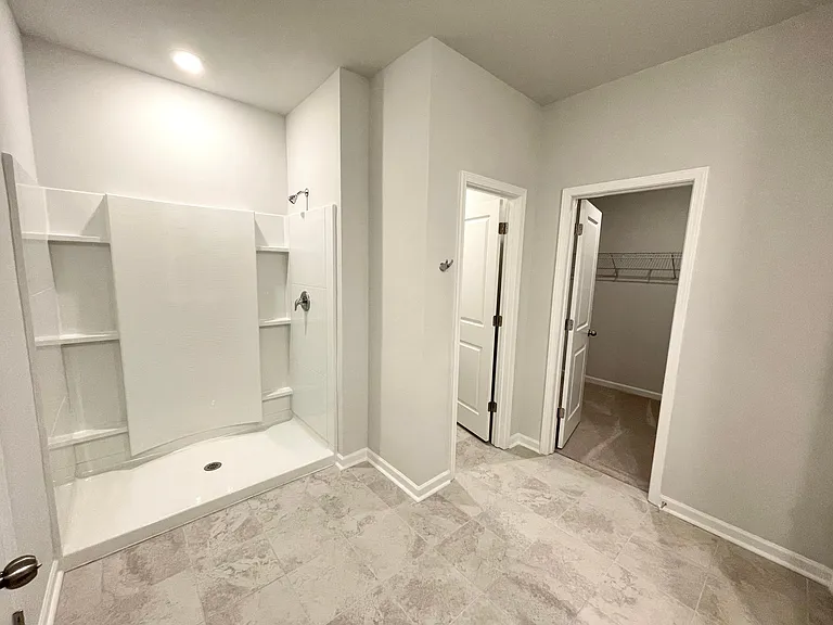 Shower will be partially enclosed.