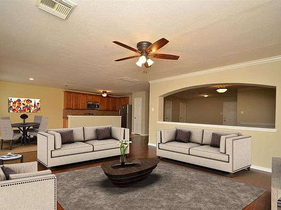 Living Room virtually staged. Living room allows you to look out to the beautiful backyard.