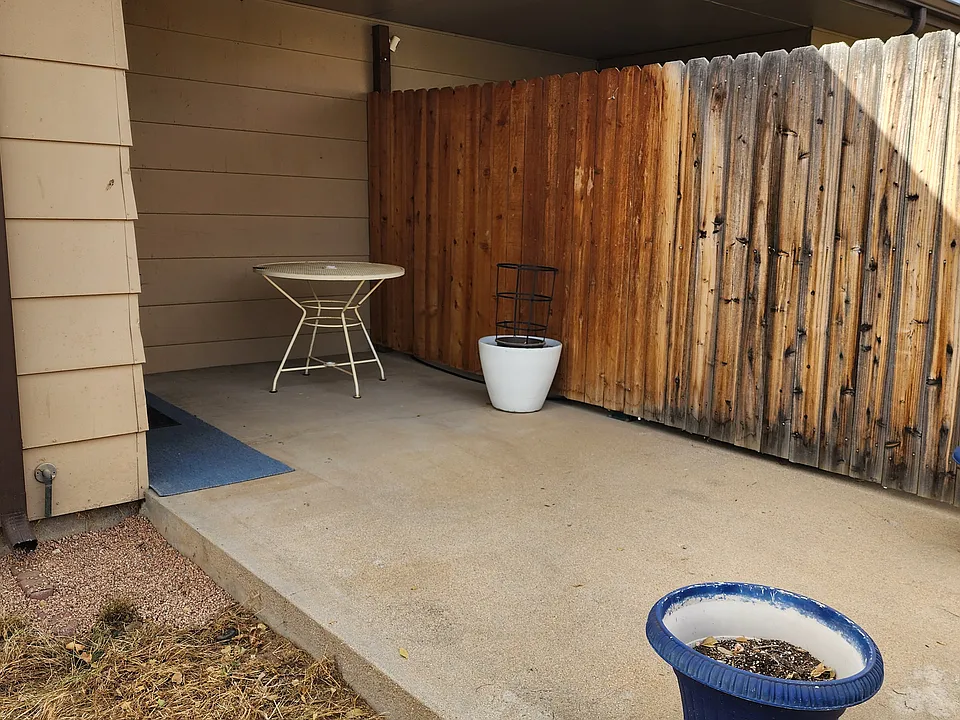 Private patio from back door in back yard area.