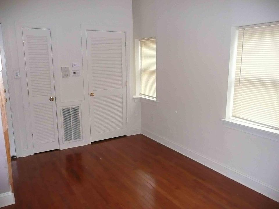 Livingroom with private HVAC Unit and Washer Dryer located in Closets