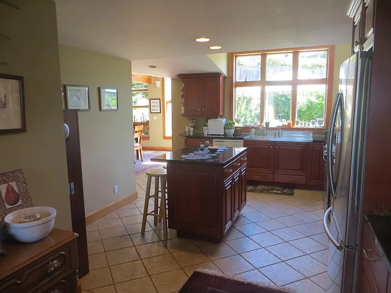 View from kitchen table through kitchen into dining room