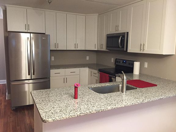 Impeccably-renovated: granite, SS appliances, spacious.