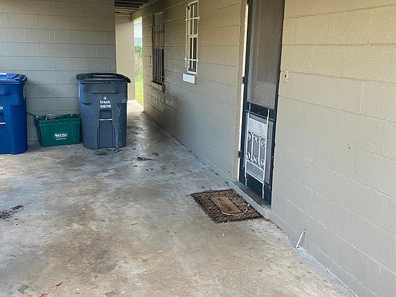 Carport with entry into kitchen.