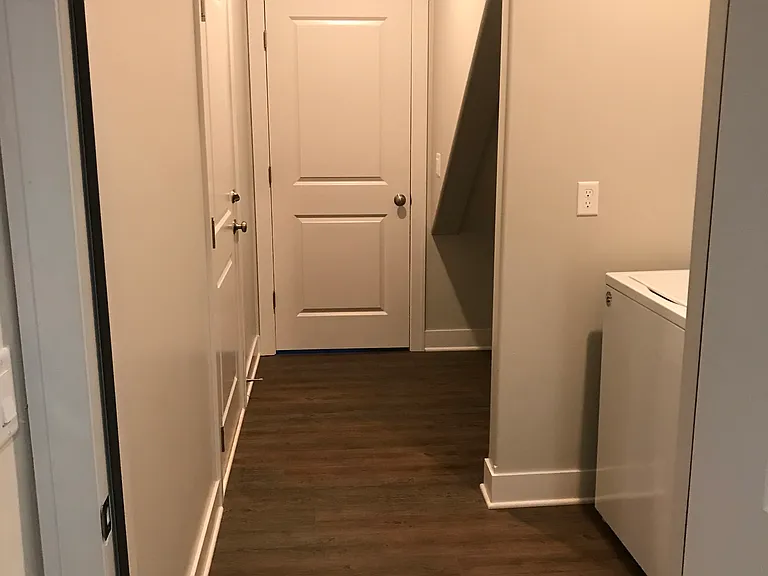 Entrance to laundry and bsmt storage