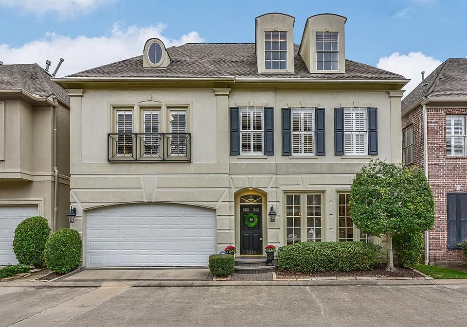 Gorgeous European style 3/2.5 features first floor living and luxury details throughout.