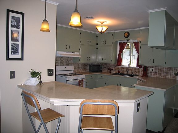 Open kitchen with bar.