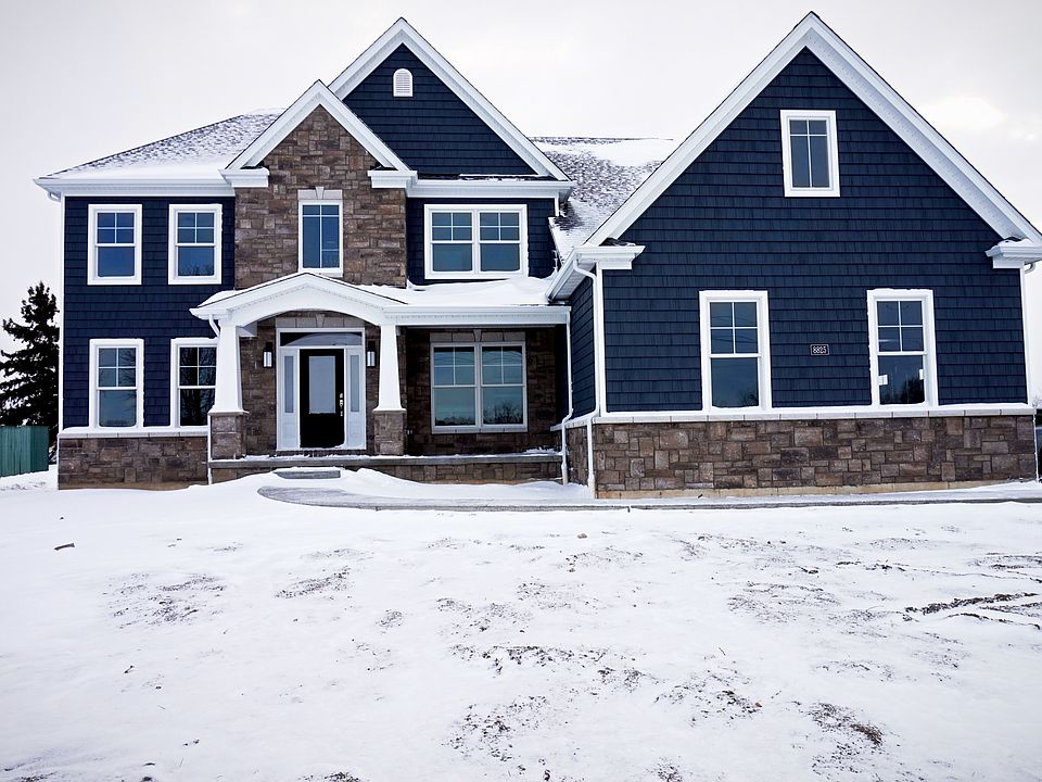 stone & covered porch facade