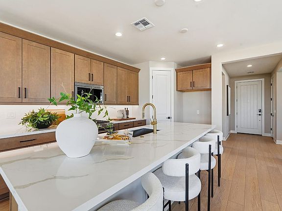 Well-appointed kitchen with beautiful cabinets and large island