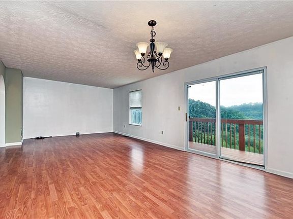 Looking towards living room, deck off of dining room