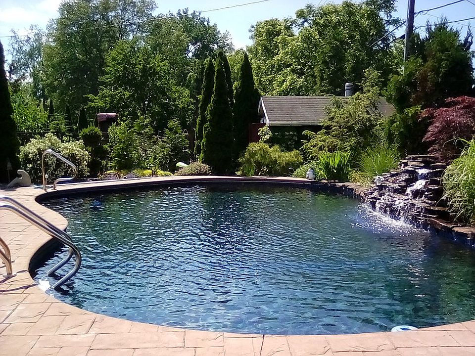 Gunite pool with black marci