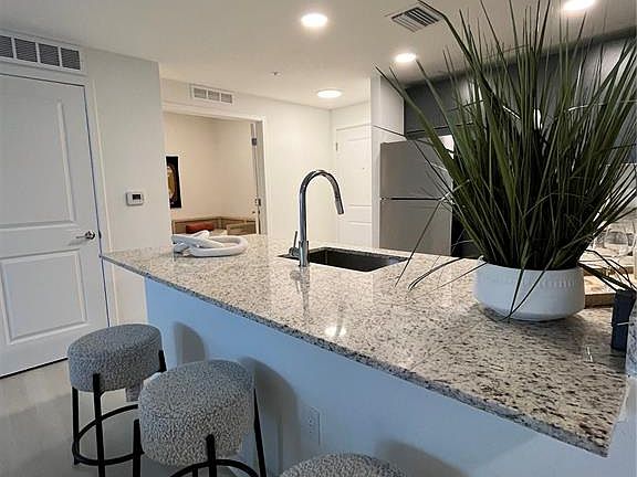 3rd image of 5563 Millenia Park Blvd #209