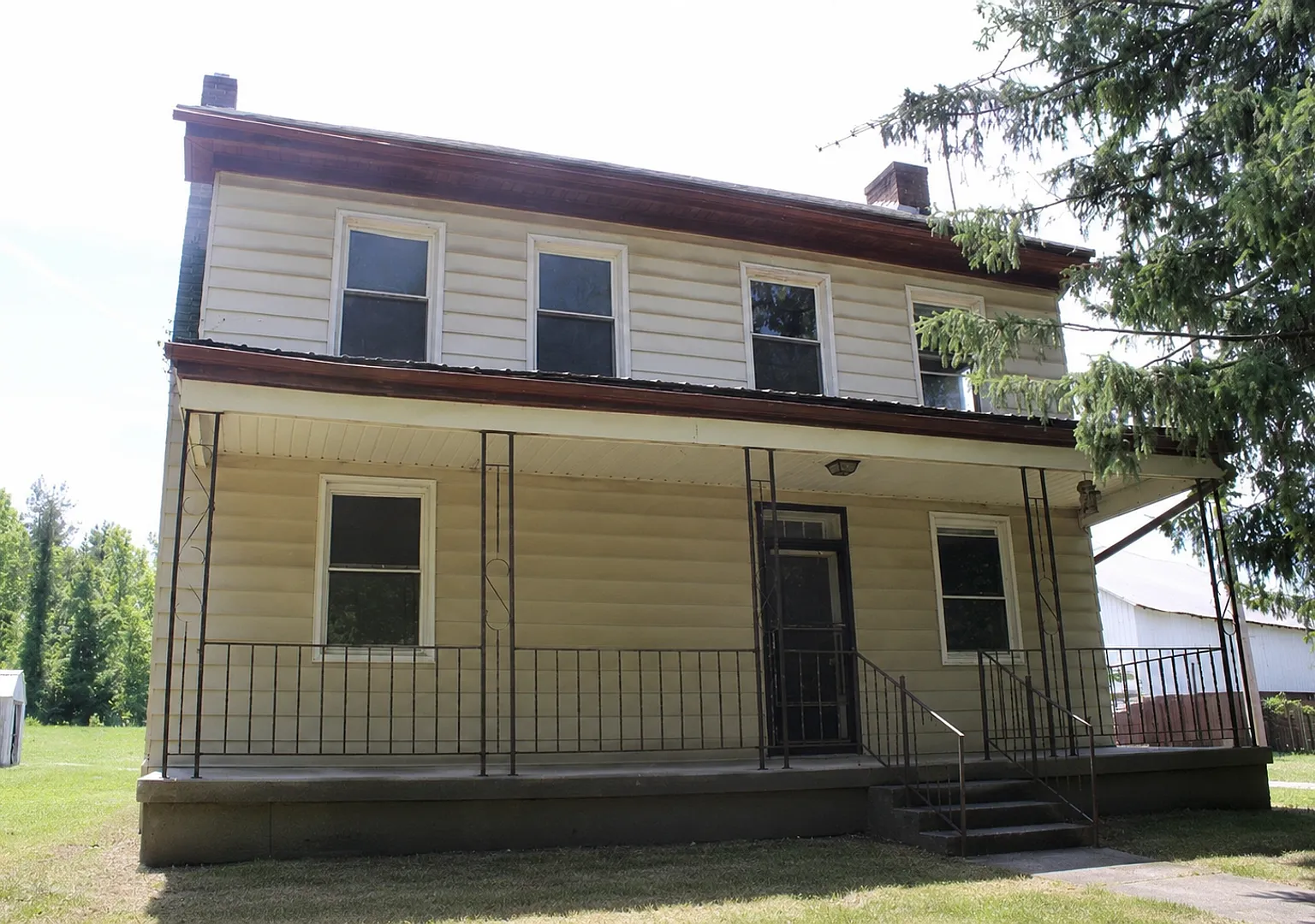 Single Family Farmhouse with Outdoor Storage — Photo 1