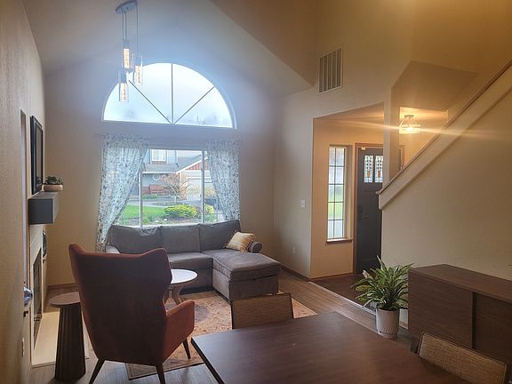 Living room. High ceilings and lots of light.