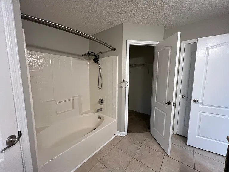 Primary Bathroom Walk in Closet 1
