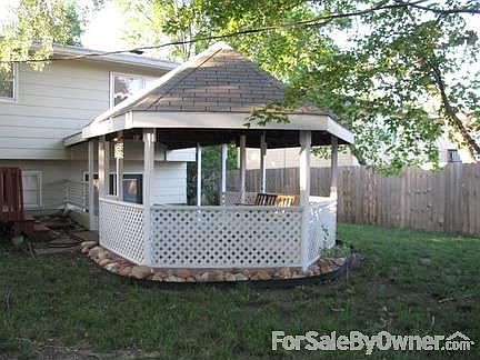 Gazebo
						:
						Walkout basement opens to gazebo with a porch swing.
