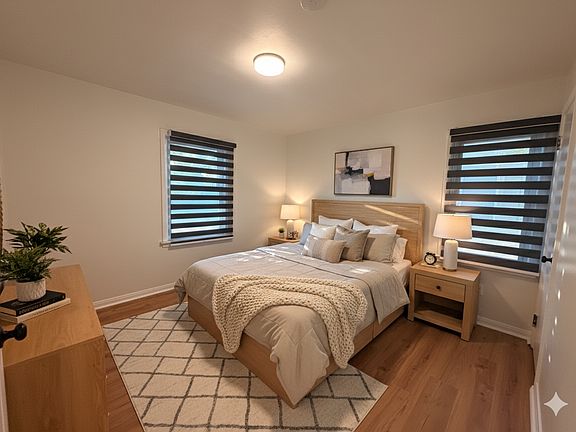 Second bedroom ideal for a home office or guest room _ flexible space with clean modern design.