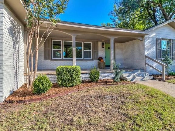 Modern total renovation with large front porch and lots of curb appeal. New energy efficient windows throughout.