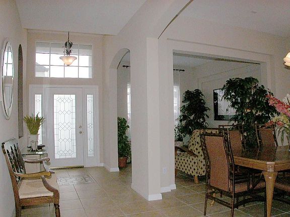 Entry foyer with formal dining and living room
