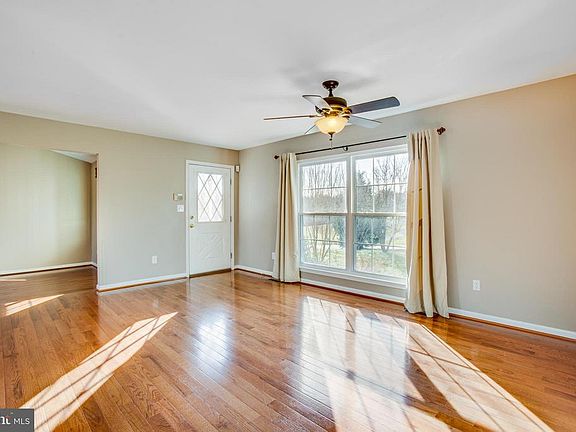 Open entry, new hardwood flooring main level.