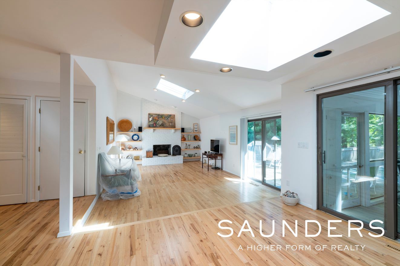  View from Dining Room to Living Room. Fireplace.