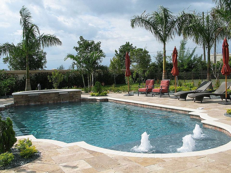 Day time view of pool and spa