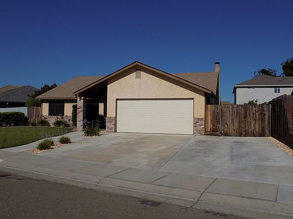 Front view with RV access parking at the side