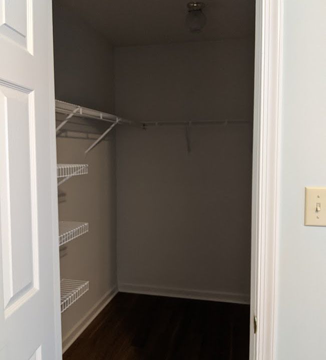 First floor master bedroom walk in closet.