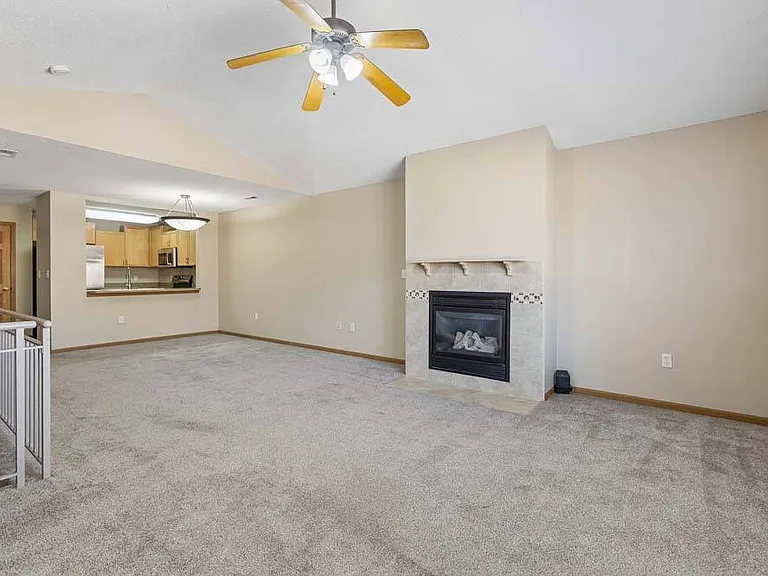 Gather around the fireplace and settle into a space designed for comfort with a polished, modern feel.