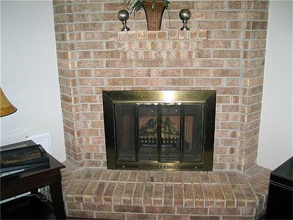 Corner Brick Fireplace