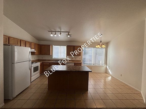 3rd image of 6334 S Acacia Desert Ave
