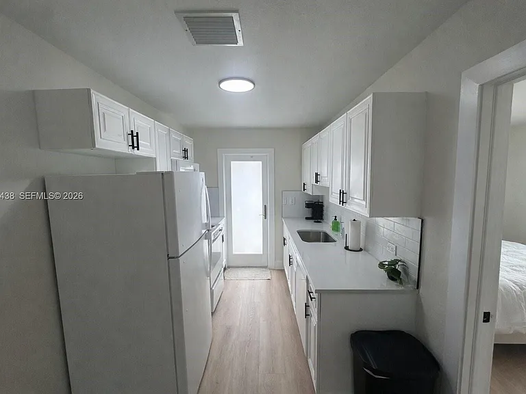 4396 SW 25th Ter #1-2 — Photo 6