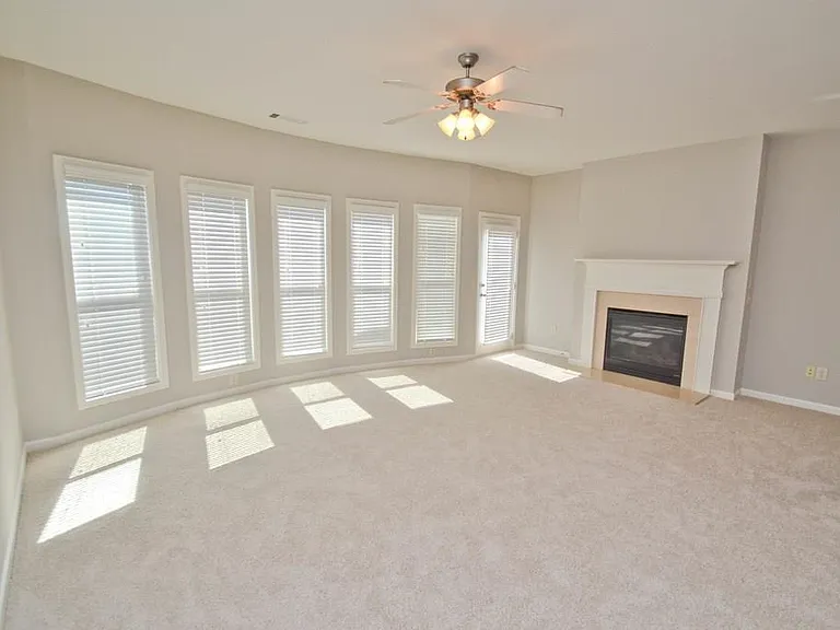 Family/Living Room with cozy fire place.