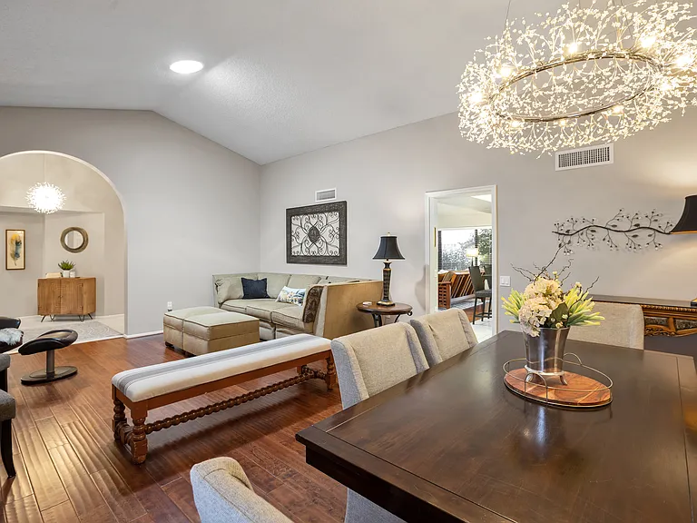 Living room and Dining room with leads into the kitchen and family room