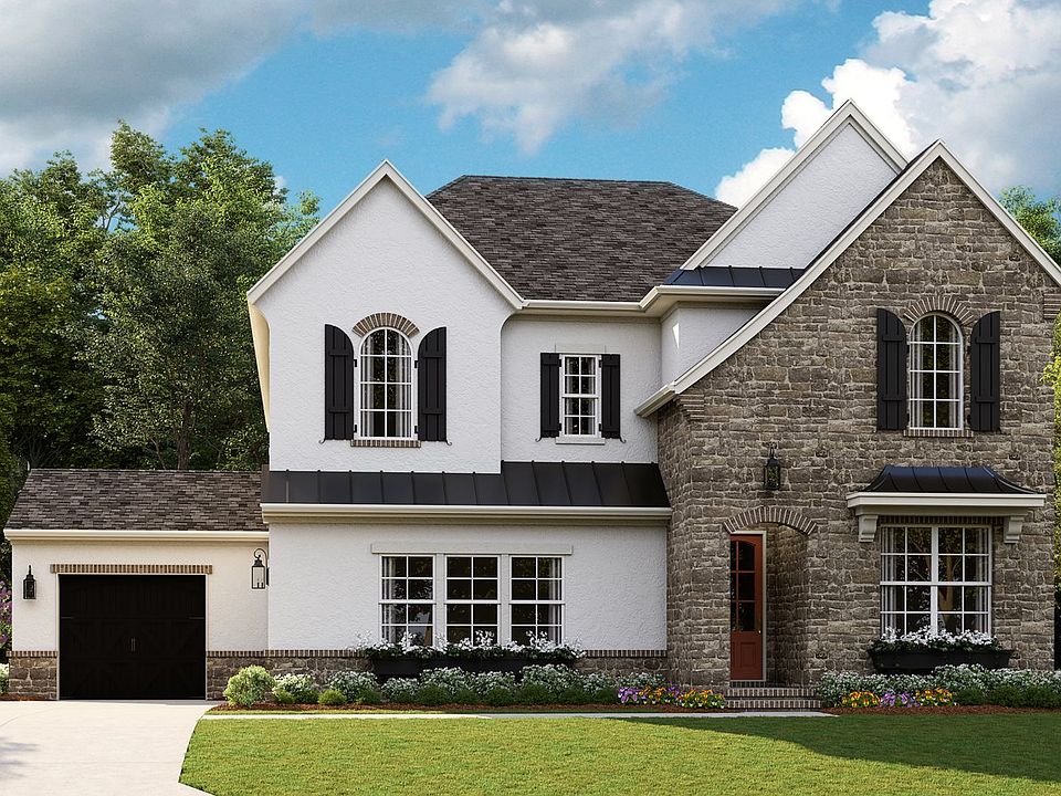 Coronado - French Cottage c 3-Car Side Load Garage Note Renderings may show optional features